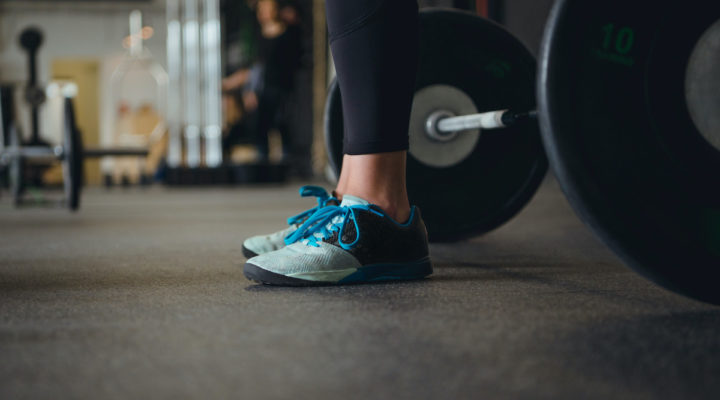 woman wearing weightlifting shoes