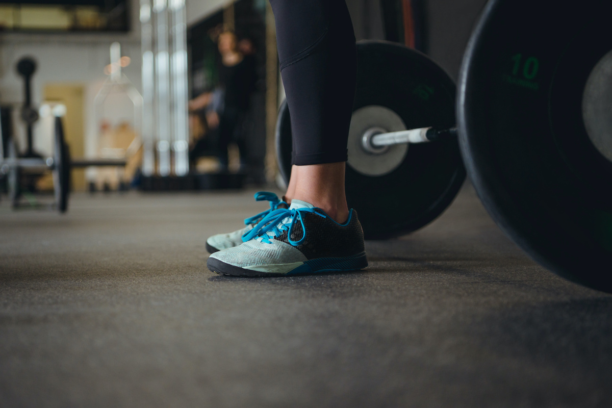 woman wearing weightlifting shoes